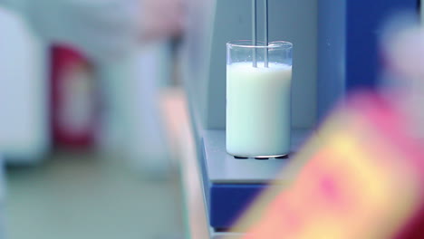 milk analysis. analysis of milk sample on laboratory equipment. modern equipment