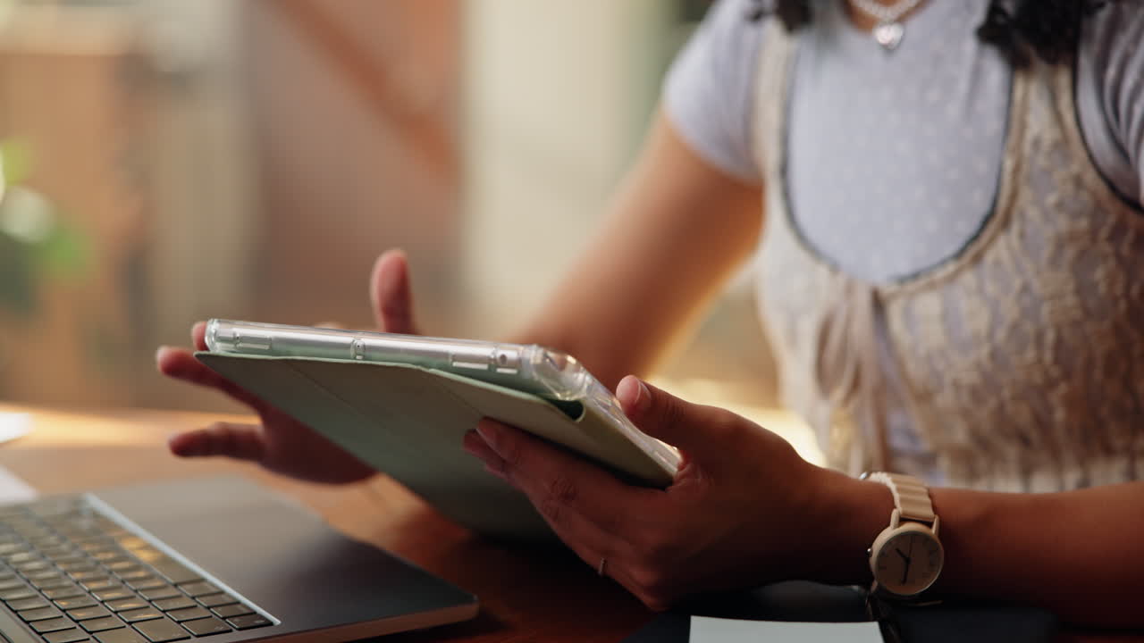 Close-up of Hands Tapping and Swiping on a Digital Tablet