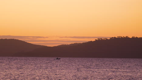 Boat-passing-in-front-of-Porquerolles-island-Hyeres-Tour-fondu-view-France