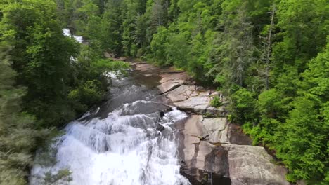 An-Excellent-Aerial-Shot-Of-Short-Waterfalls-Surrounded-By-Greenery-In-North-Carolina