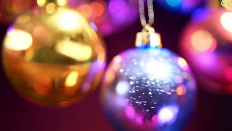 close-up of shiny christmas ornaments