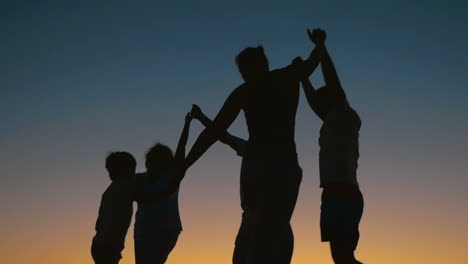 Family-Round-Dancing-at-Night