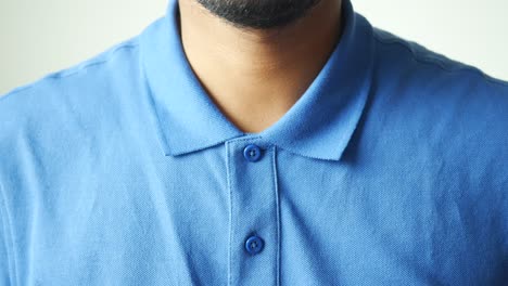 close-up of a blue polo shirt