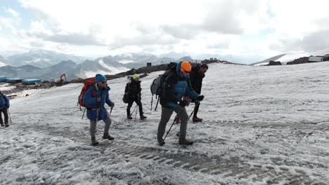 hikers on a glacier