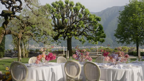 luxury outdoor dining in a garden setting with a mountain view