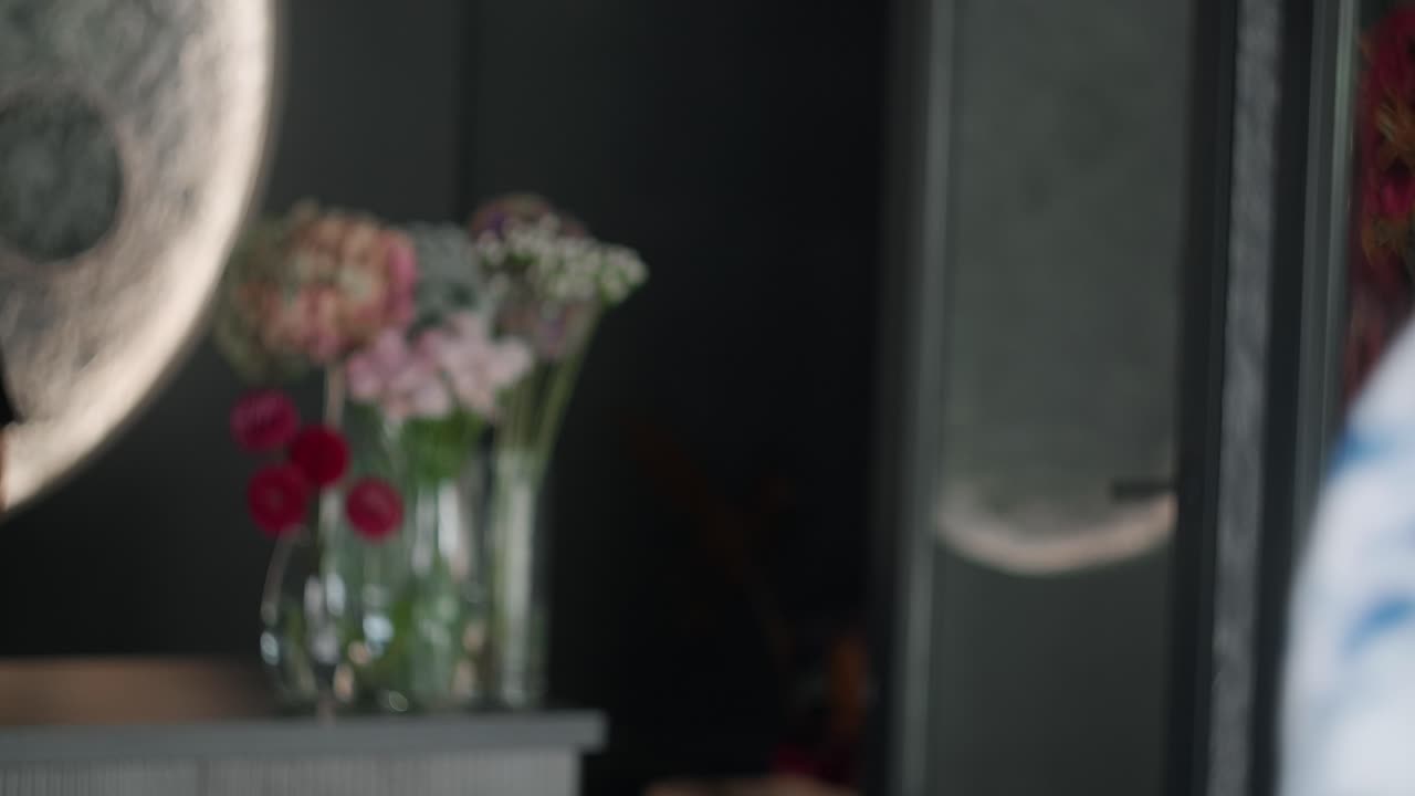 Woman Receiving a Bouquet of Flowers at a Florist
