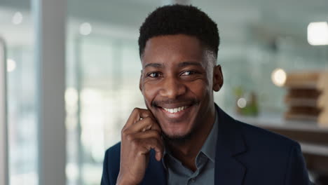 Face,-smile-and-young-businessman-in-office