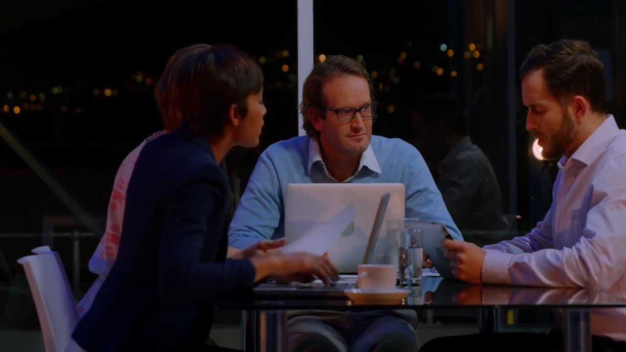 Businesspeople working in office