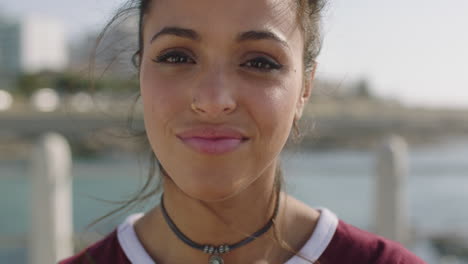 close-up-portrait-of-young-beautiful-hispanic-woman-smiling-cheerful-feeling-relaxed-on-beautfiul-beachfront