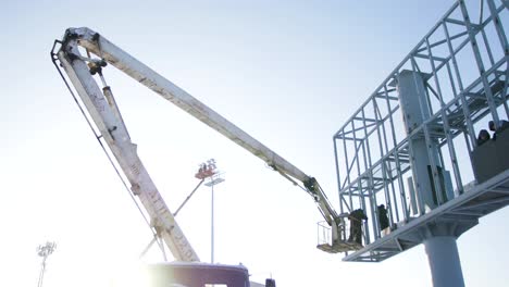 installing a large billboard