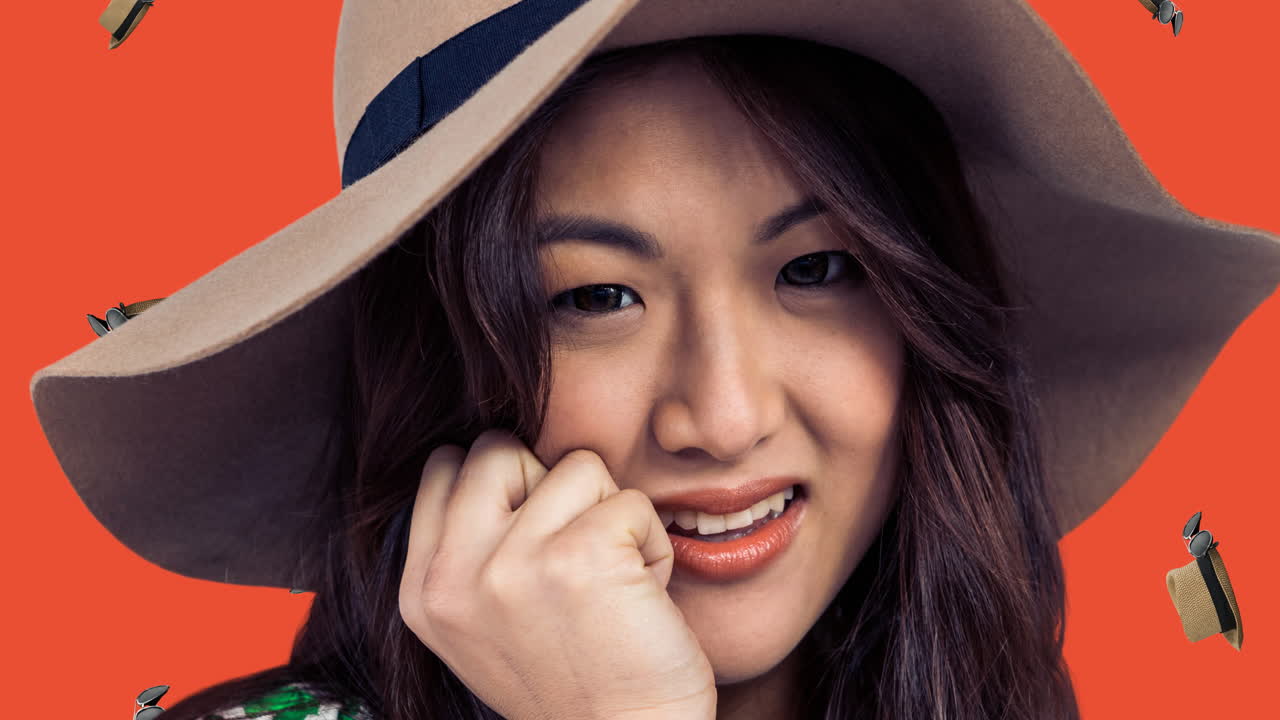 ⁇ 은 배경에 모자를 쓰고 떨어지는 모자를 입은 아시아 여성의 애니메이션