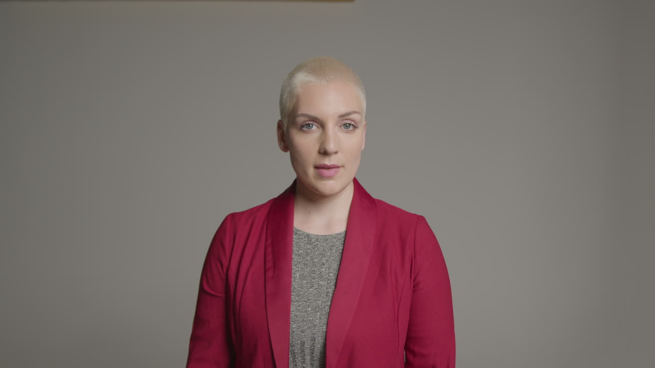 Female model posing to the camera for a studio portrait 03