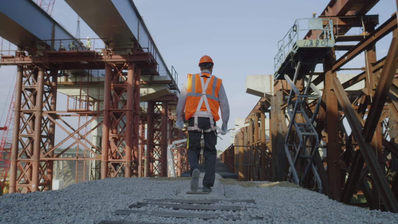 Construction Worker on Bridge Construction Site