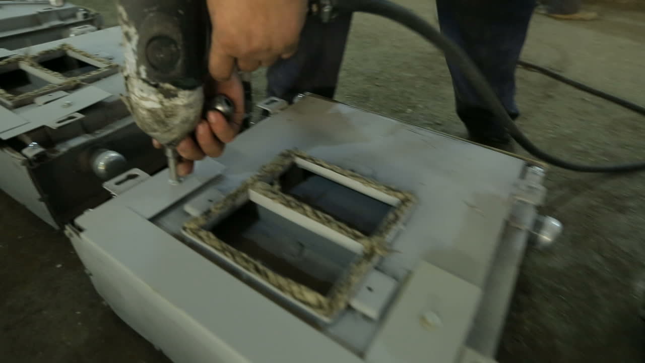 BAR, UKRAINE - AUGUST 2017: View of male worker works in a factory