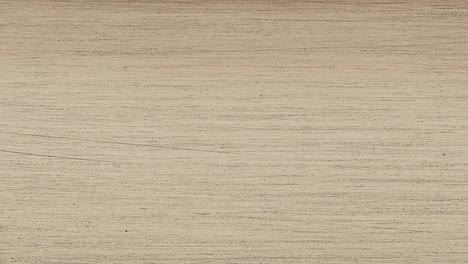 camera moves laterally across a different timber section, showcasing distinctive knots and rich grain lines