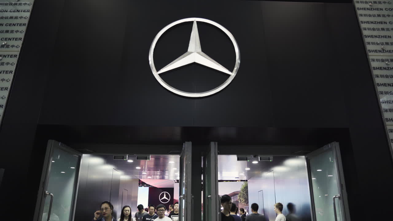 Visitors walking in and out of the Gate to the Mercedes-Benz Pavilion at 2019 International Auto Show in Shenzhen, China. June 1, 2019.