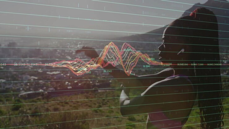 Woman extending arms on hillside and initiating waveform graphics visualizing data over city valley