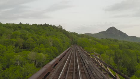 onawa trestle bridge tracking backwards over tracks summer sunrise