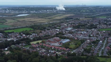 Aerial-view-above-Halton-North-England-Runcorn-Cheshire-countryside-industry-landscape-slow-tracking-right