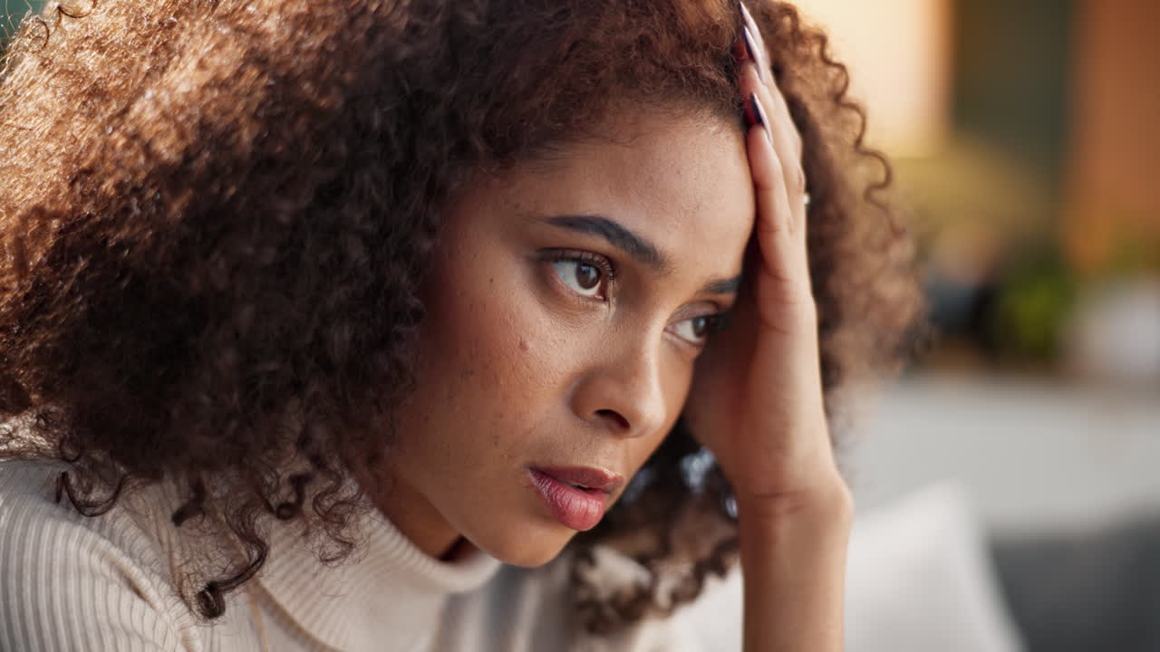Worried woman with curly hair