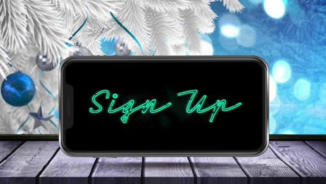 animación del texto de inscripción en la pantalla del teléfono inteligente con árbol de navidad en fondo azul