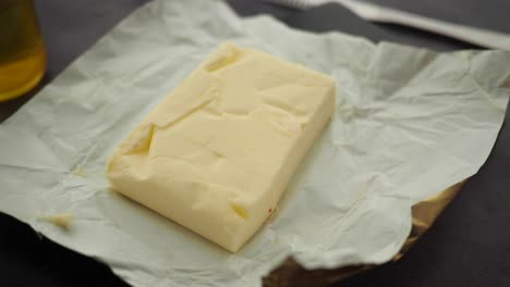 block of butter on parchment paper