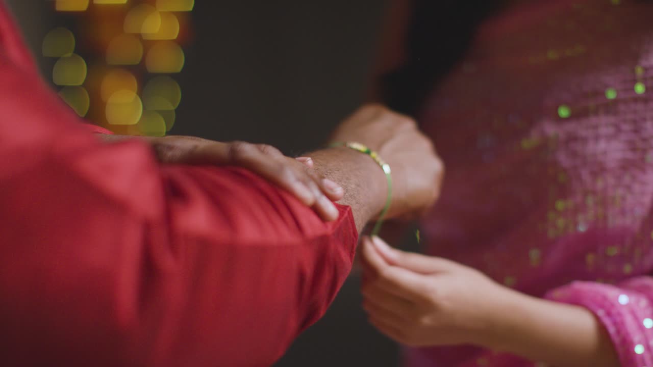 Sister Ties Rakhi and Brother Gifts Money for Raksha Bandhan 2