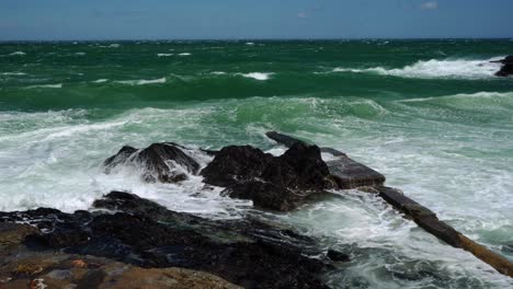 waves pound the rocky coast around collioure during high winds