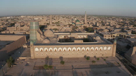 aerial drone point of the itchan kala and alla kouli khan madrasa at the old walled city of khiva in uzbekistan