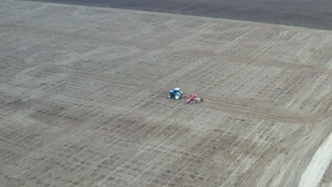 Aerial-view-of-agricultural-lands-that-are-plowed-before-sowing