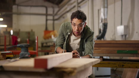 man woodworking in workshop