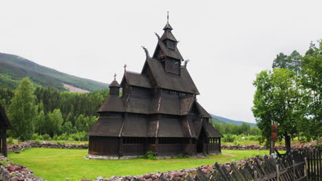 establishing shot of the heddal stave church in norway