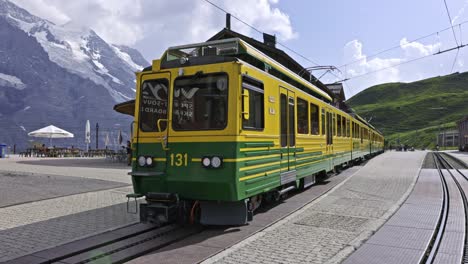 jungfrautravelpass traing going to kleine scheideg, old train to eiger mountain