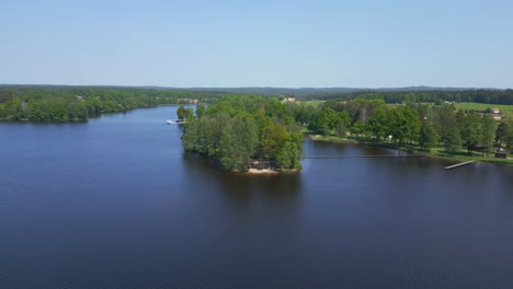 great aerial top view flight natural summer paradise idyllic island in lake, chlum in czech, day 2023