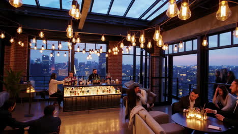vibrant rooftop bar with city views at night