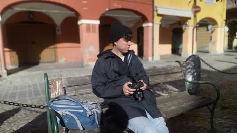 photographer taking photos in an old european town