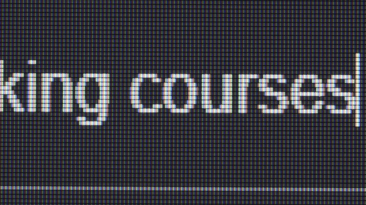 Close-up of Cookie and Cooking Course text on a computer screen