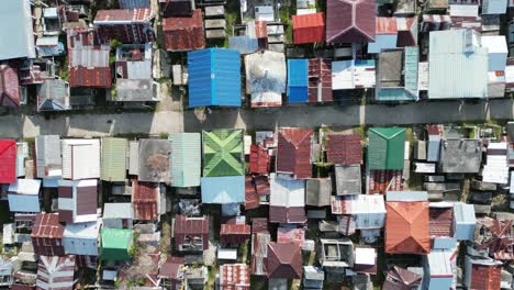 top down drone shot of colorful local cemetery plot in the philippines