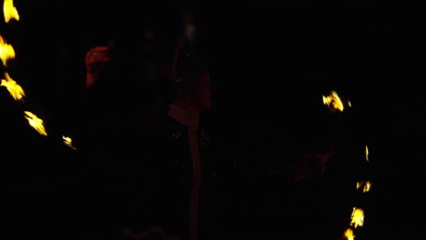 fire juggler in traditional costume
