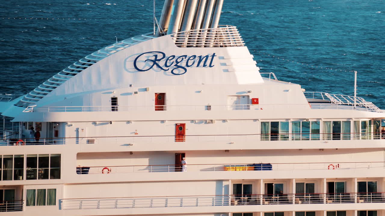 Monte Carlo, Monaco - October 14, 2024: Large cruise ship docked in the Monaco Marina in the evening