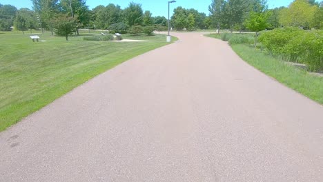 POV-thru-Rear-window-while-driving-thru-a-county-park-in-rural-South-Dakota