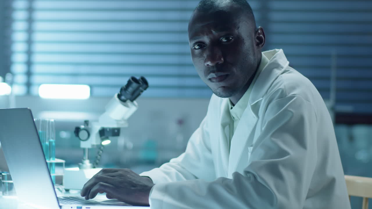 Portrait of African American Lab Scientist with Laptop