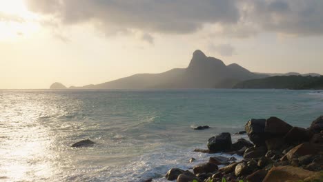 Dreamy-and-Beautiful-Sunset-at-rocky-beach-in-Con-Dao-Island-in-Vietnam-during-sunset-or-sunrise