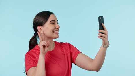 Peace,-hands-and-selfie-y-woman-in-studio