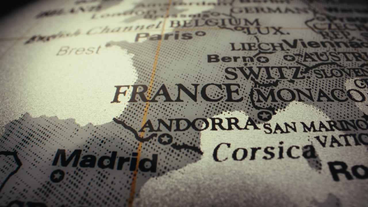 Close-up of a vintage world map, focusing on Western Europe