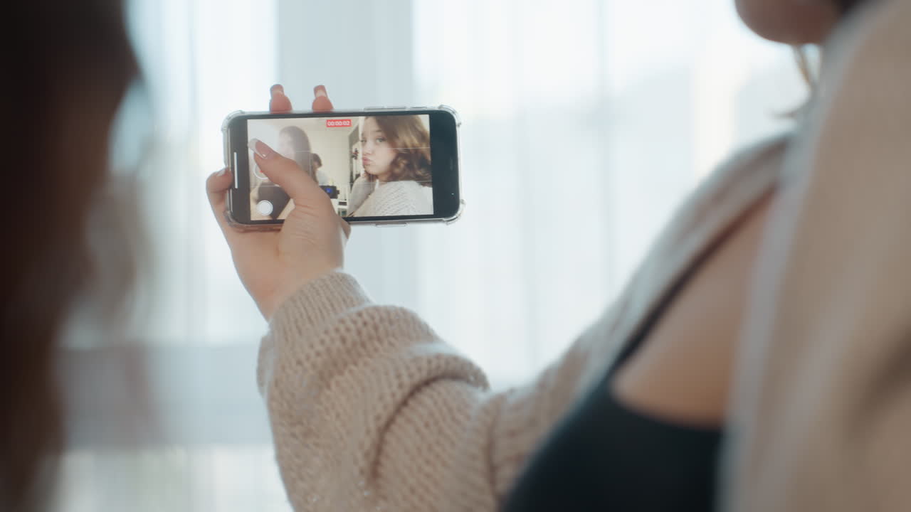 Roommates Enjoy Sunlight For Relaxed Picture, Two Friends Take Comfortable Selfie Near Sunny Window, Casual Friends Moments Captured Naturally Indoors With Warm Sunlight Illuminating Faces