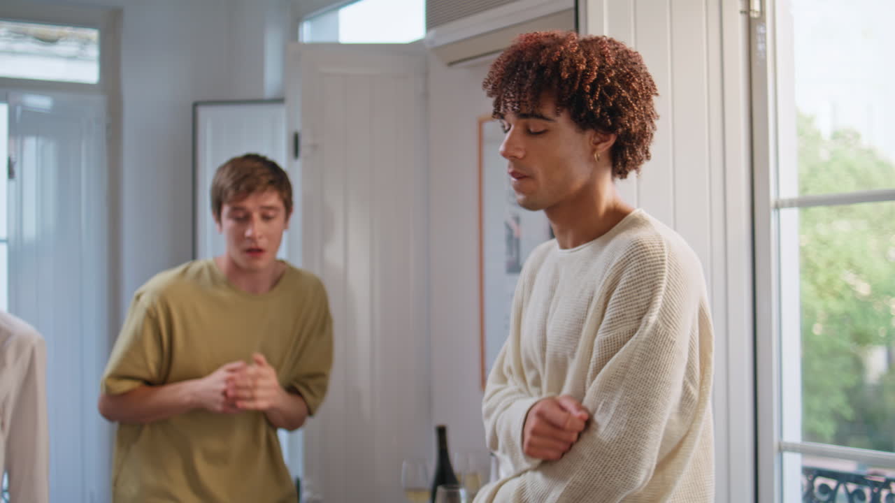 Group people enjoying party at spacious room closeup. Friends dancing together