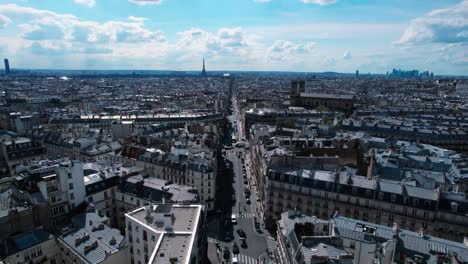 paris aerial view of city, flying forward above street with eiffel tower