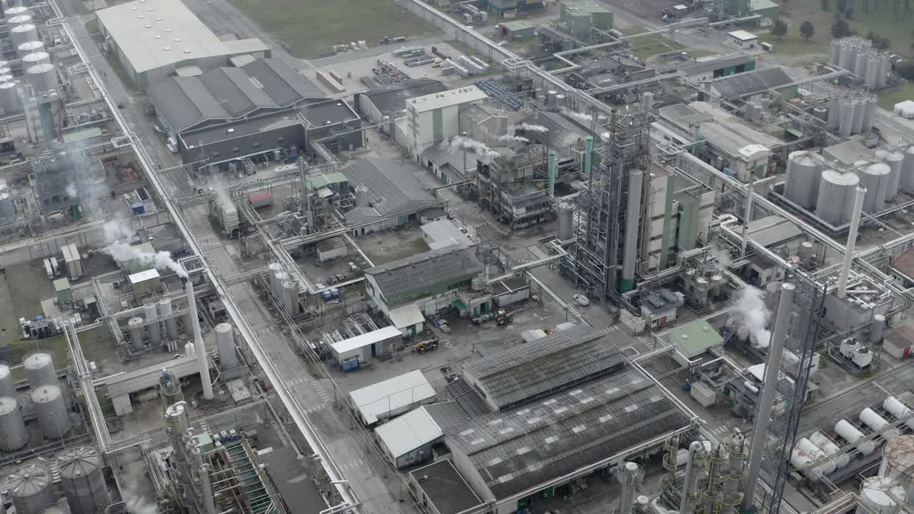 Aerial of DRT green chemistry facility structures, France. Drone top-down view