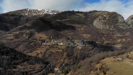 Aerial:-small-town-in-the-mountains-in-autumn